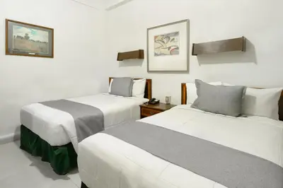 Cama o camas de una habitación en Hotel Premier Saltillo Coahuila