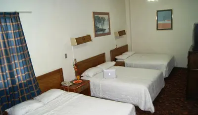 Cama o camas de una habitación en Hotel Premier Saltillo Coahuila