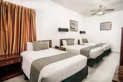 Cama o camas de una habitación en Hotel Premier Saltillo Coahuila