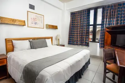 Cama o camas de una habitación en Hotel Premier Saltillo Coahuila
