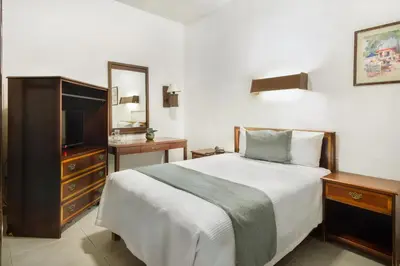 Cama o camas de una habitación en Hotel Premier Saltillo Coahuila