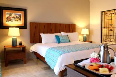 Cama o camas de una habitación en Las Villas Hotel & Golf By Estrella del Mar
