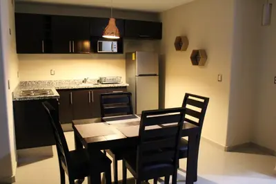 Una cocina o zona de cocina en Departamento zona dorada