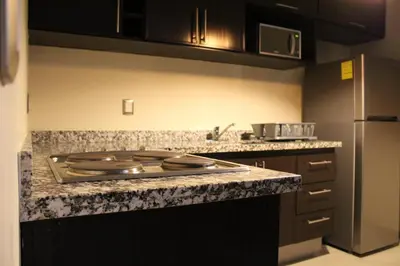 Una cocina o zona de cocina en Departamento zona dorada