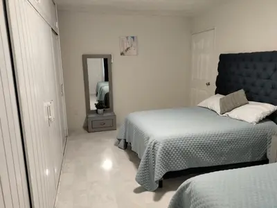 Cama o camas de una habitación en Amplio Condominio Ibis Mazatlán Zona dorada