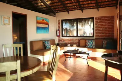 Zona de estar de Sukasa Bungalows