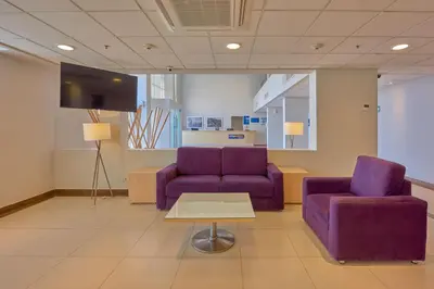 Zona de estar de City Express by Marriott Saltillo Sur