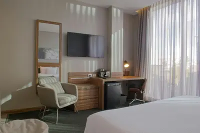 Cama o camas de una habitación en Four Points by Sheraton Distrito Uno Chihuahua