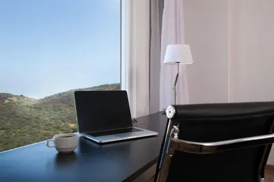 Una televisión o centro de entretenimiento en Fiesta Inn Express Ciudad Obregón