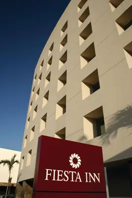Certificado, premio, señal o documento que está expuesto en Fiesta Inn Culiacan