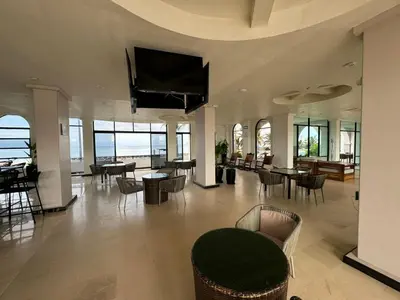 Una televisión o centro de entretenimiento en Hacienda Mazatlán sea view