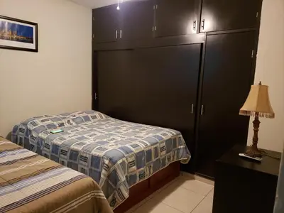Cama o camas de una habitación en Departamentos Mazatlán