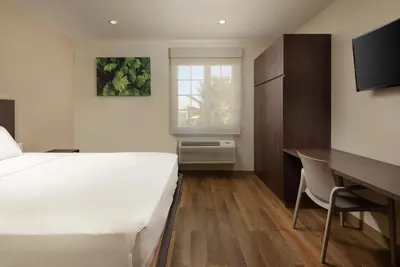 Cama o camas de una habitación en Extended Suites Saltillo Galerías
