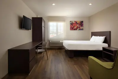 Cama o camas de una habitación en Extended Suites Saltillo Galerías