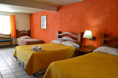 Cama o camas de una habitación en Villa Santa Cruz Creel