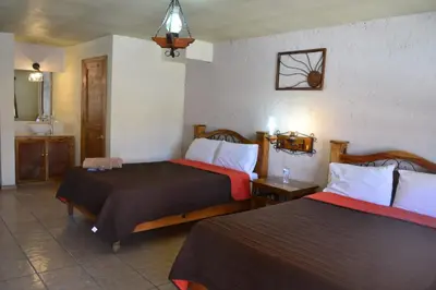 Cama o camas de una habitación en Villa Santa Cruz Creel