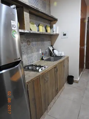 Una cocina o zona de cocina en Aguacate Suites