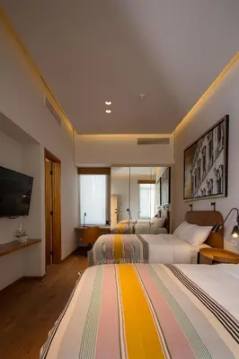 Cama o camas de una habitación en Central Hotel Boutique