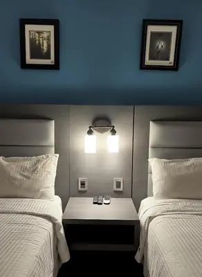 Cama o camas de una habitación en Hotel El Rancho