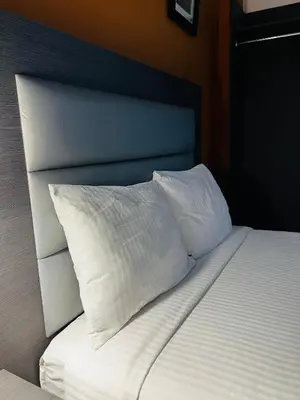 Cama o camas de una habitación en Hotel El Rancho