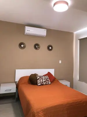 Cama o camas de una habitación en Condominio con alberca en Zona Cerritos
