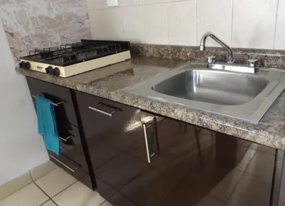 Una cocina o zona de cocina en Departamento privado zona de la UACH