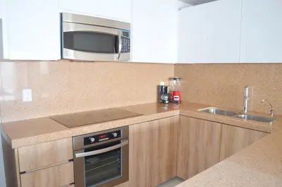 Una cocina o zona de cocina en Bahia Marina Departamentos