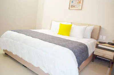 Cama o camas de una habitación en Bahia Marina Departamentos