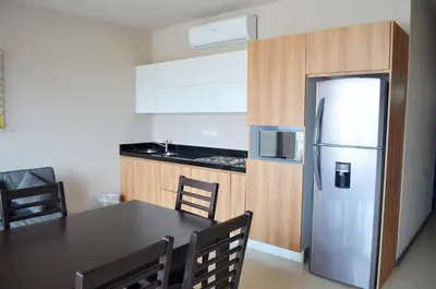 Una cocina o zona de cocina en Bahia Marina Departamentos