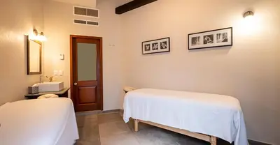 Cama o camas de una habitación en Casa Lucila Mazatlán Curamoria Collection