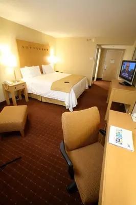 Cama o camas de una habitación en Holiday Inn Express Saltillo Zona Aeropuerto by IHG