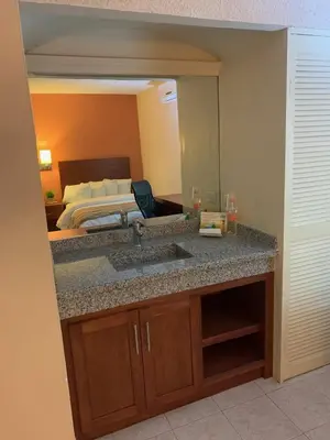 Cama o camas de una habitación en Casagrande Hotel