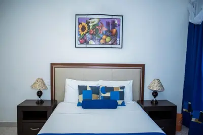 Cama o camas de una habitación en La Estancia Apartments Mazatlan