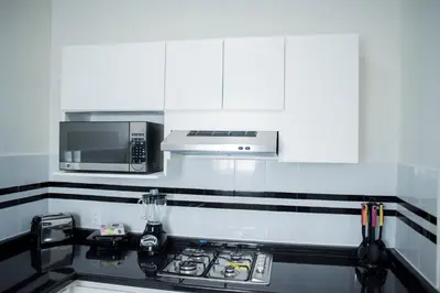 Una cocina o zona de cocina en La Estancia Apartments Mazatlan