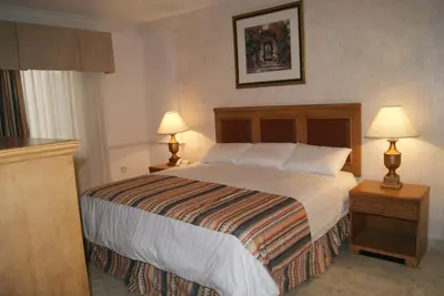 Cama o camas de una habitación en Savoy Express