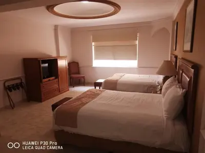 Cama o camas de una habitación en Savoy Express