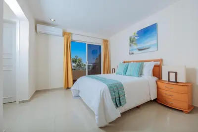 Cama o camas de una habitación en Isla Mazatlan Residence Club