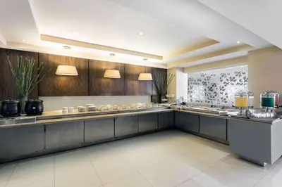 Una cocina o zona de cocina en Wyndham Garden Obregon