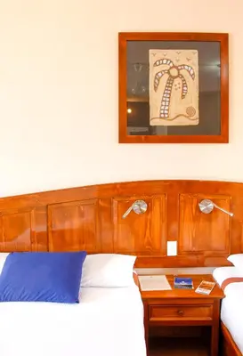 Cama o camas de una habitación en Hotel Angra
