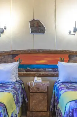 Cama o camas de una habitación en Hotel Oasis