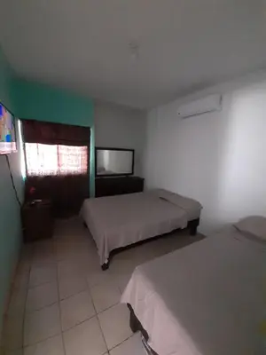 Cama o camas de una habitación en Casa 