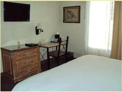 Cama o camas de una habitación en Hotel Gobernador