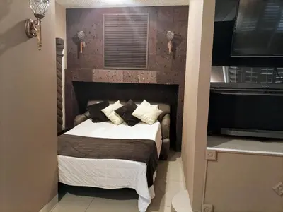Cama o camas de una habitación en Confortable y acogedor Departamento por UACH II