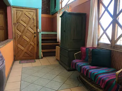 Zona de estar de Departamento tipo cabaña en Creel