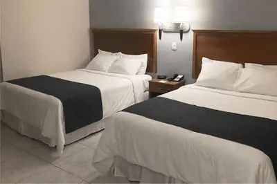 Cama o camas de una habitación en Days Inn by Wyndham Piedras Negras