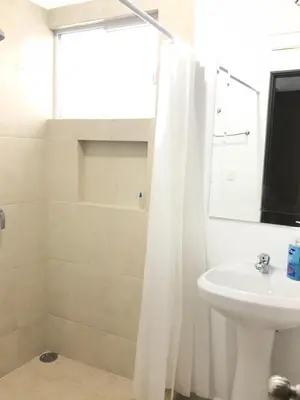 Un baño de CASA EN PRIVADA FRENTE A LA PLAYA CON ALBERCA!