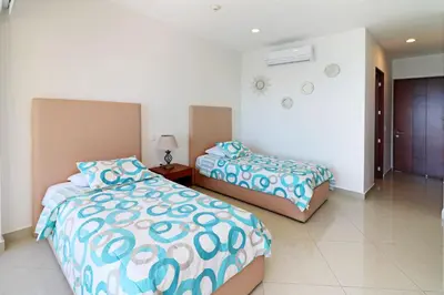 Cama o camas de una habitación en GAVIAS GRAND MAZATLAN APT. 1415