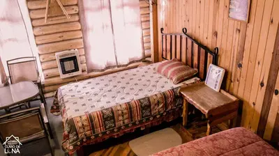 Cama o camas de una habitación en Cabañas Claro de Luna