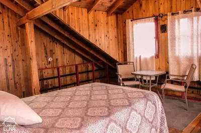 Cama o camas de una habitación en Cabañas Claro de Luna