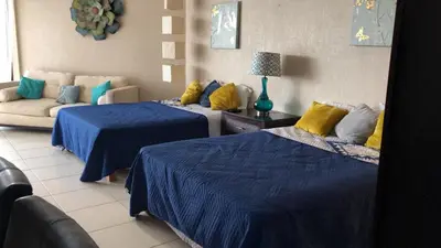 Cama o camas de una habitación en Estudio Frente Al Mar Posada